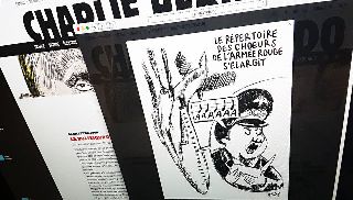 Charlie Hebdo опубликовал карикатуру на крушение российского Ту-154