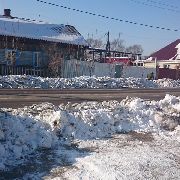 МУП «БОСС» завалил прессованным снегом ворота жителей Волочаевской и других улиц