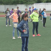 На стадионах Уссурийского городского округа «Городской» и «Локомотив» 14 июня прошла общегородская зарядка (5 фотографий)